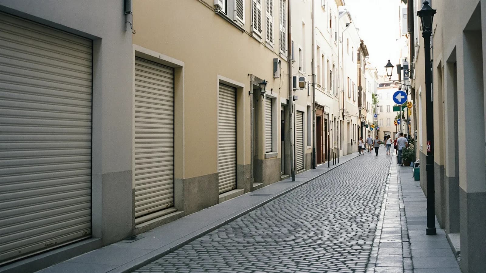 Cobbled European street in early morning light with no people